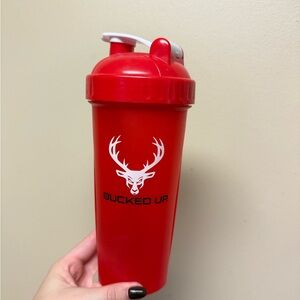 Red Shaker Bottle Bucked up
